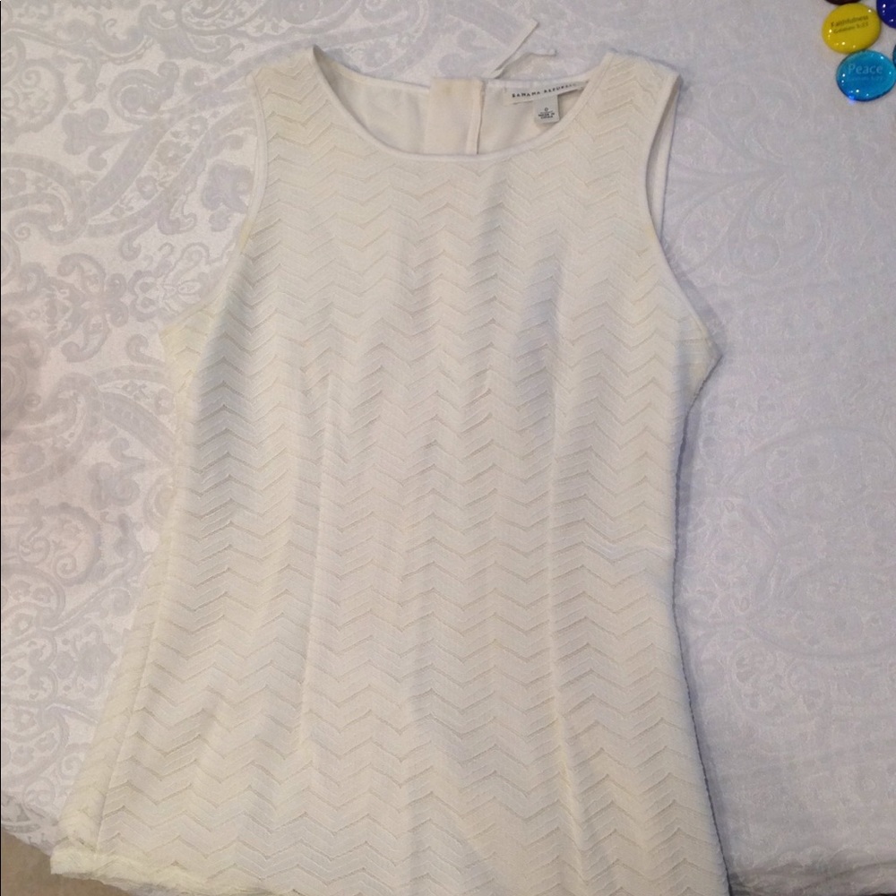 Ivory sleeveless shirt